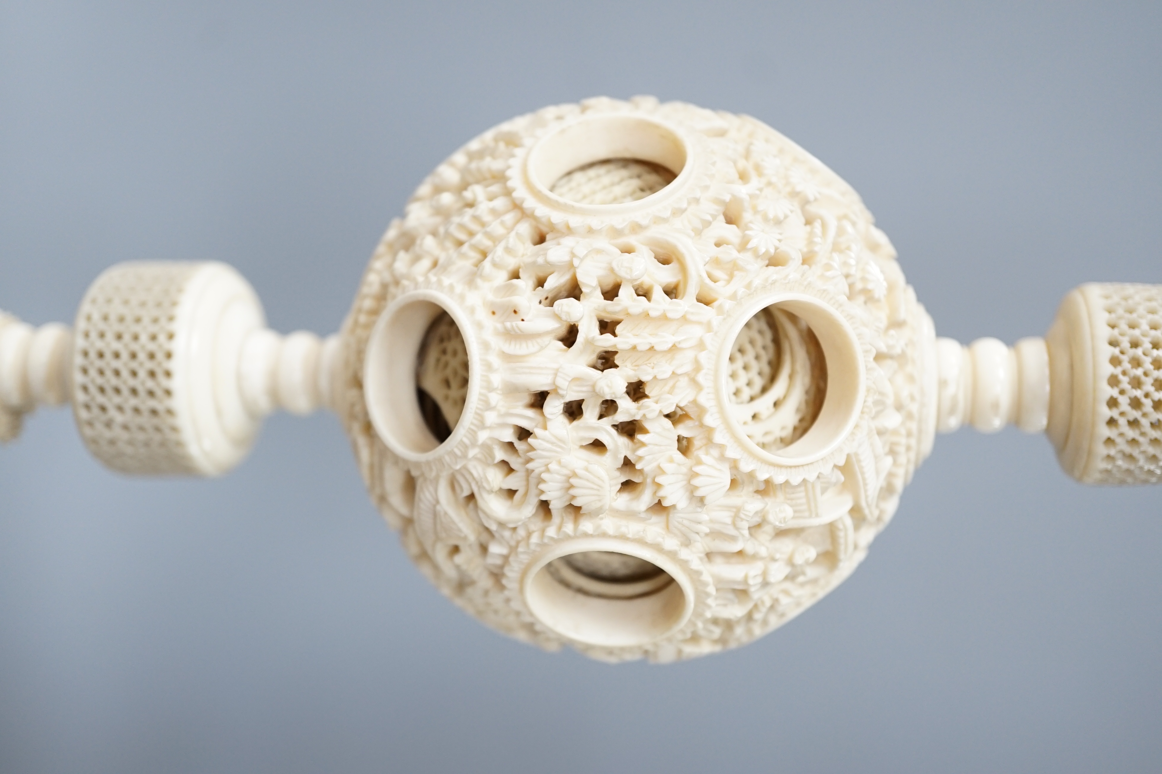 A boxed 19th century Chinese ivory concentric puzzle ball 41cm